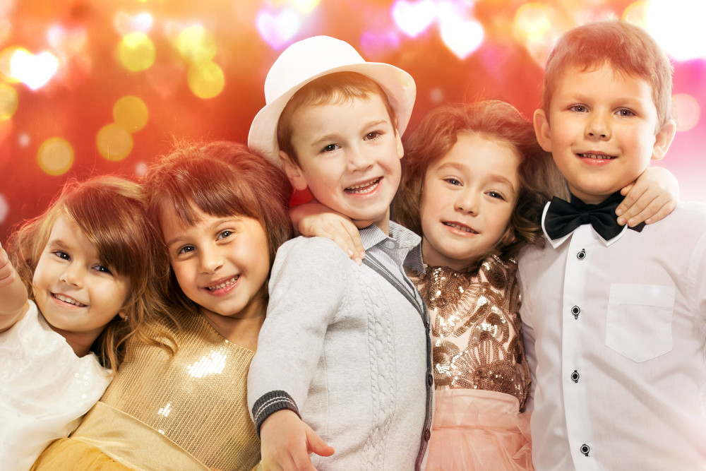 Group of happy children at a wedding or pary