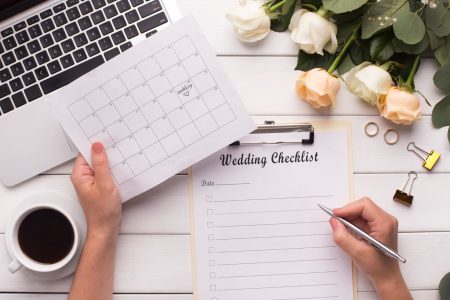 Wedding planning checklist and computer