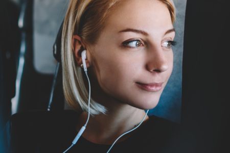 Woman on plane, travelling on business