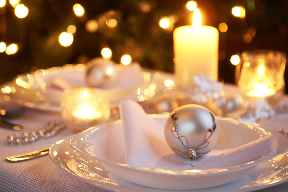 Candles and decorations on festive table setting