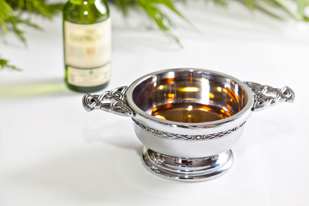 Traditional Scottish quaich filled with whisky