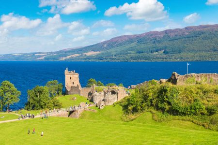 Visitors to Urquhart Castle in the summertime