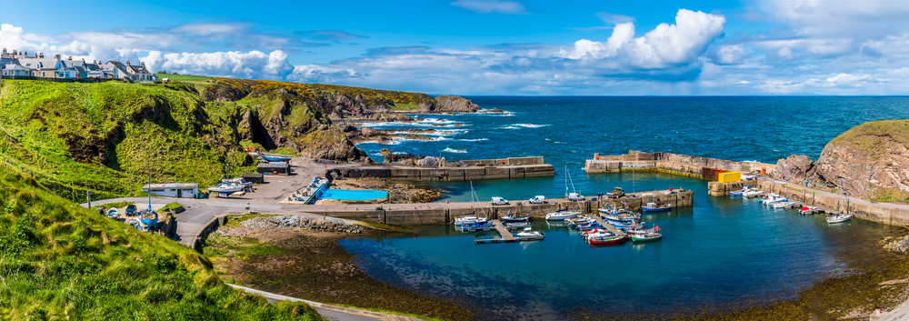 A view over the harbour and shoreline at Portknockie, Scotland on a summers day.