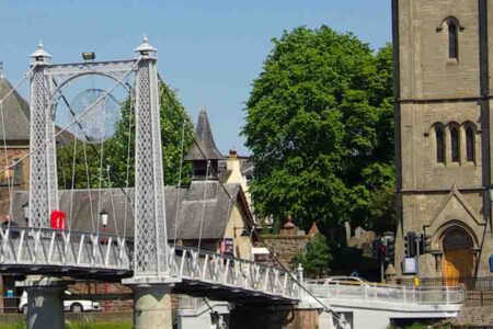 Inverness with a bus by a bridge.